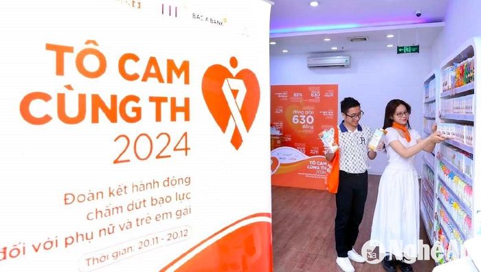 Hoạt động Tô cam tại các cửa hàng TH True milk ở Hà Nội. Ảnh: VFS