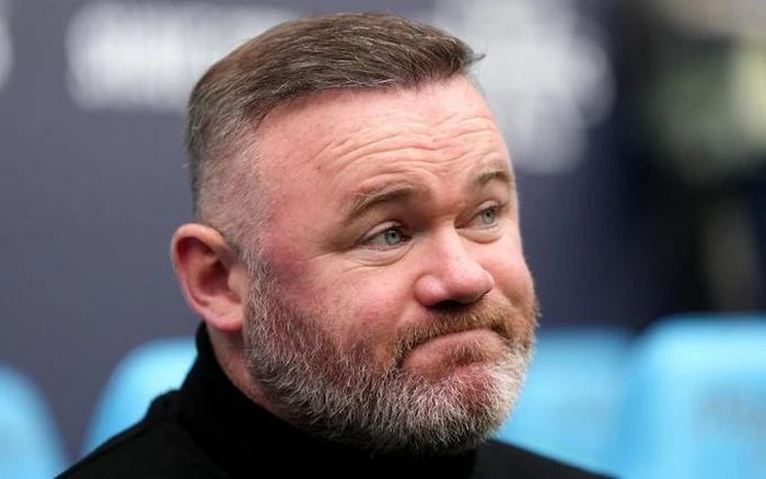 Sự nghiệp huấn luyện của Rooney tiếp tục trải qua quãng thời gian u ám. Ảnh: Reuters.