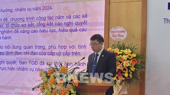 Tổng giám đốc Tổng Công ty Phạm Lê Phú đọc Báo cáo tổng kết tại hội nghị. Ảnh: Mai Phương/BNEWS/TTXVN