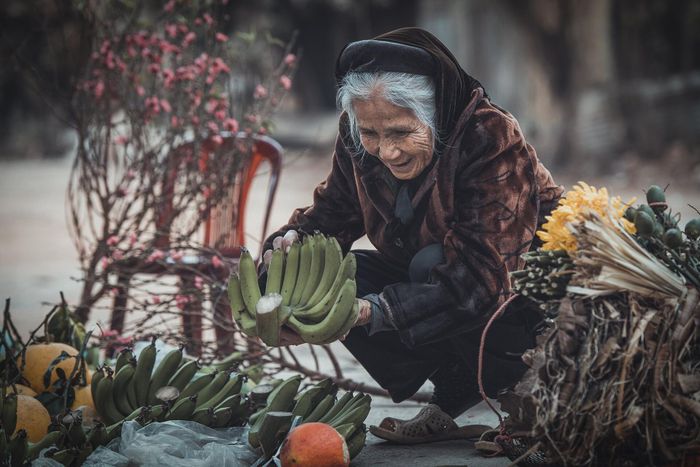  Phiên chợ Tết ngày cuối năm thấm đượm hương vị quê hương. Ảnh: Khang Chu Long 