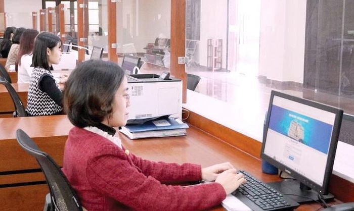 Hệ thống Kho bạc vào cuộc thúc đẩy giải ngân đầu tư công ngay từ đầu năm. Ảnh: QB