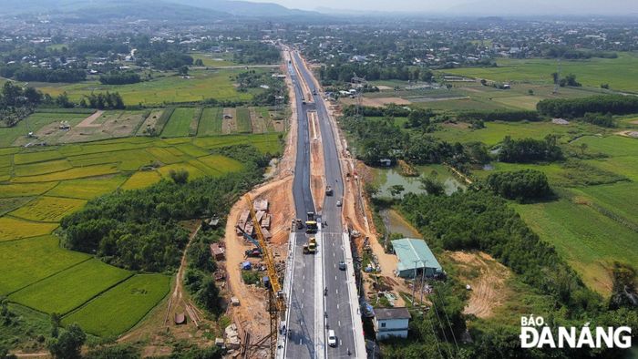 Phần đường dẫn có chiều dài 1.204m; điểm đầu (Km0+00) giao với Quốc lộ 14B tại Km31+087 (thuộc xã Hòa Khương, huyện Hòa Vang, thành phố Đà Nẵng), điểm cuối (Km1+408) khớp nối với đường Vành đai phía Bắc tỉnh Quảng Nam tại xã Điện Tiến, thị xã Điện Bàn. 