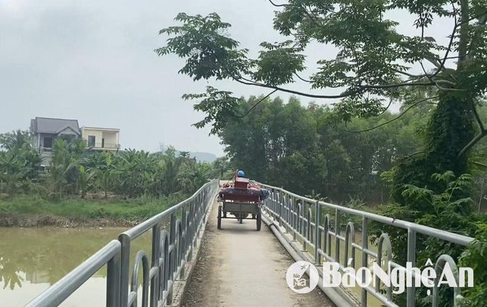 Cầu được tu sửa, người dân xã Đô Thành yên tâm qua lại. Ảnh: Văn Trường