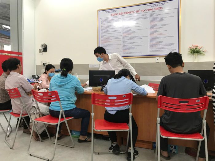  Chụp ảnh (hoặc quay video) ký văn bản công chứng được áp dụng khi người dân thực hiện công chứng từ ngày 1-7. Ảnh: HOÀNG HÙNG 