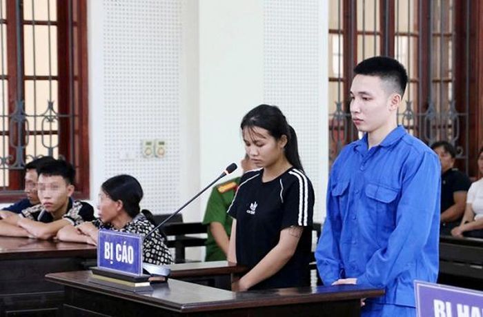 Vợ chồng Nguyễn Thị Kim Anh và Nguyễn Văn Thanh tại phiên xét xử.