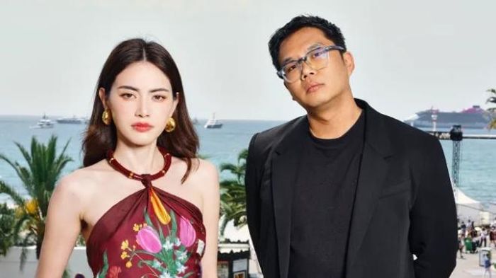Đạo diễn Ratchapoom Boonbunchachoke (phải) và nữ diễn viên Davika Hoorne tại Liên hoan phim Quốc tế Cannes 2025