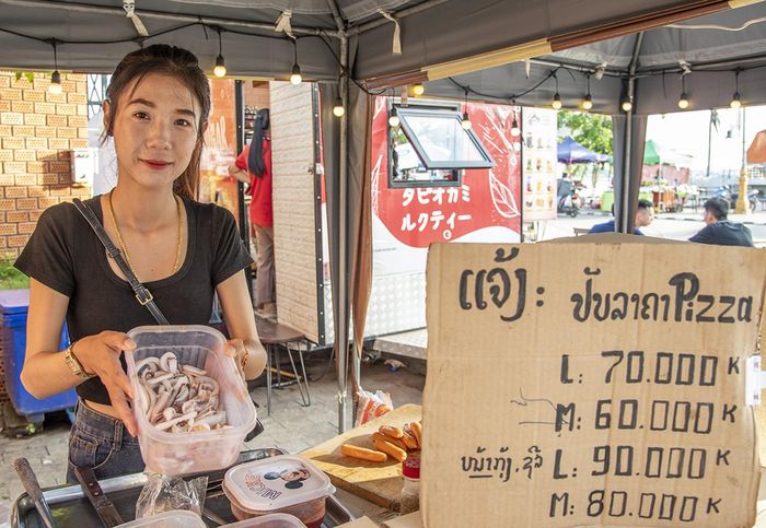  Tua mực để gia vị vào bánh pizza hải sản. Ảnh: Văn Chương 