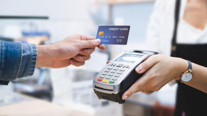 Không cần dùng mật khẩu khi thanh toán thẻ VISA qua máy POS. Ảnh minh họa