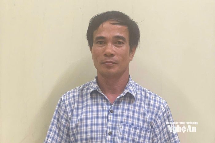 Ông Hòa tại cơ quan công an. Ảnh: PV