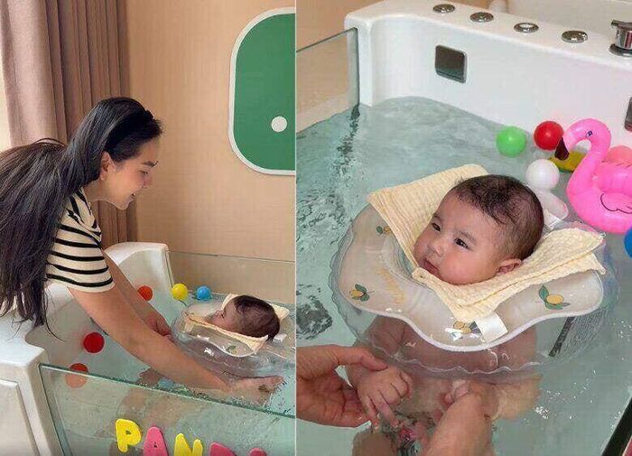 Cô thường dành thời gian đưa con trai đi dạo, đi bơi.