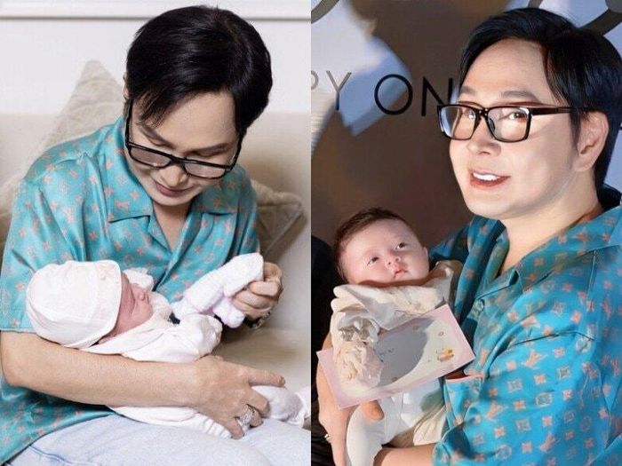 Vũ Luân chăm con chu đáo, bế bồng không rời tay.
