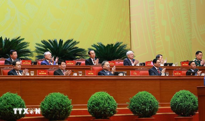  Đoàn Chủ tịch Đại hội tại phiên thảo luận, sáng 21/1. (Ảnh: TTXVN) 