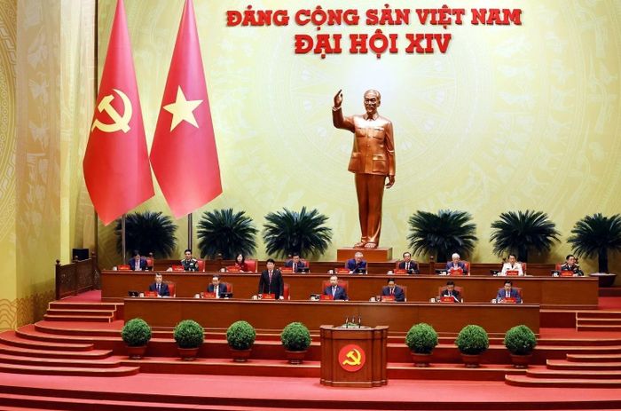 Đoàn chủ tịch Đại hội XIV điều hành phiên thảo luận ngày 21/1. Ảnh: TTXVN
