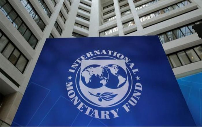 Biển hiệu kèm logo IMF. Ảnh: The Tribune