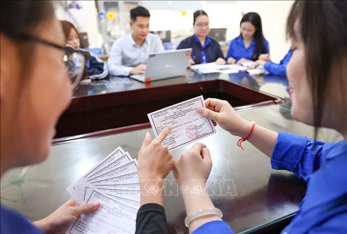 Trường Đại học Sư phạm Hà Nội đã lập danh sách, rà soát cho từng nhóm cử tri để đảm bảo việc phát thẻ và bỏ phiếu đúng quy định. Ảnh: Thanh Tùng