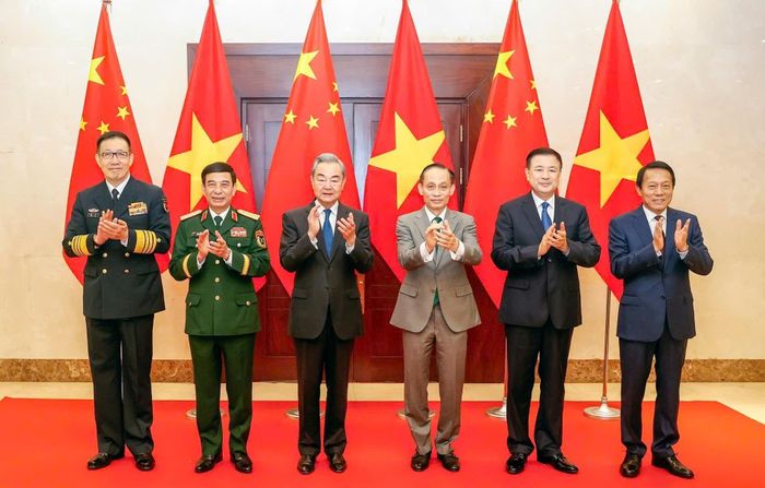 Bộ trưởng các bộ: Ngoại giao, Quốc phòng và Công an Việt Nam - Trung Quốc tại Hội nghị, ngày 16-3. Ảnh: VIẾT CHUNG 