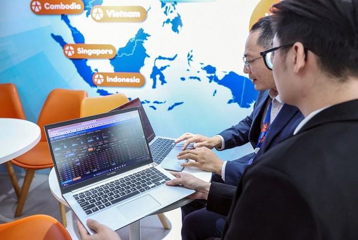 Việc nâng hạng thị trường chứng khoán Việt Nam sẽ tạo tác động tích cực đến tâm lý nhà đầu tư. Ảnh: Đức Thanh