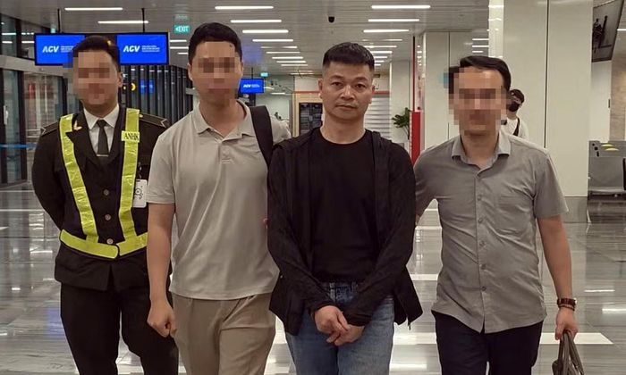 Công an bắt giữ Nguyễn Tài Minh. Ảnh: CACC
