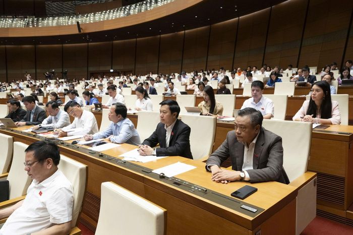 Các đại biểu nghe tờ trình và báo cáo thẩm tra dự án Luật sửa đổi, bổ sung một số điều của Luật Trợ giúp pháp lý được trình Quốc hội sáng 9/4/2026