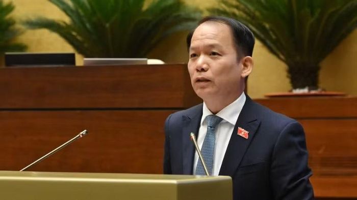 Bộ trưởng Tư pháp Hoàng Thanh Tùng giải trình trước Quốc hội về nội dung đại biểu quan tâm. (Ảnh: THỦY NGUYÊN)