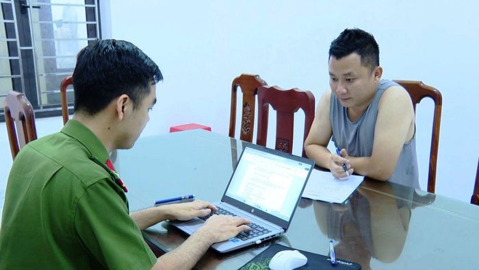 Vũ Xuân Đoàn tại cơ quan công an. Ảnh: CACC