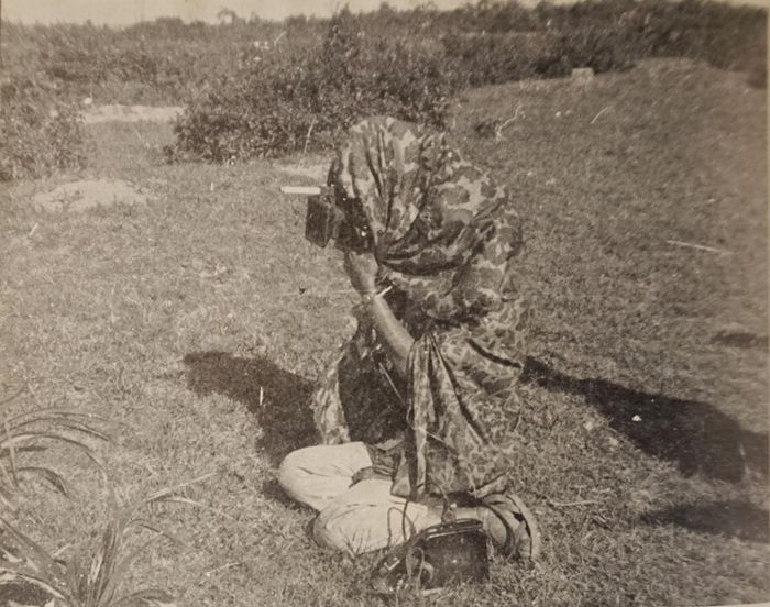 Anh Nguyễn Quang Tuấn - người trèo lên cột cờ. Ảnh: Xuân Phượng