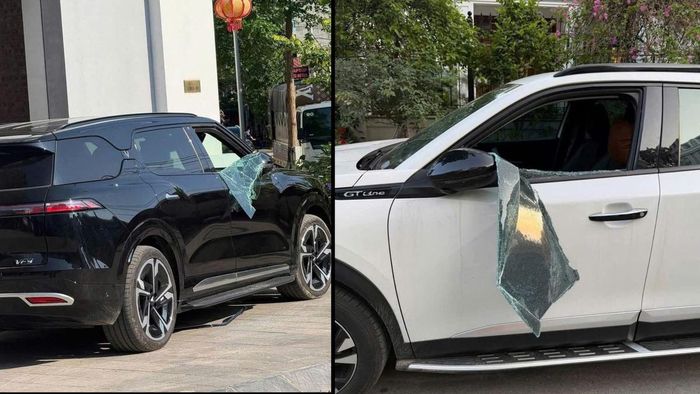 Hai chiếc xe ô tô bị phá kính hư hỏng nặng.