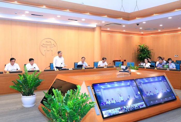 Quang cảnh buổi họp tại điểm cầu trụ sở UBND TP. Hà Nội