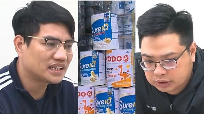 Bị can Hồ Sỹ Ý (trái), Đặng Trung Kiên và tang vật là sữa bột giả bị Công an thu giữ. Ảnh: VTV
