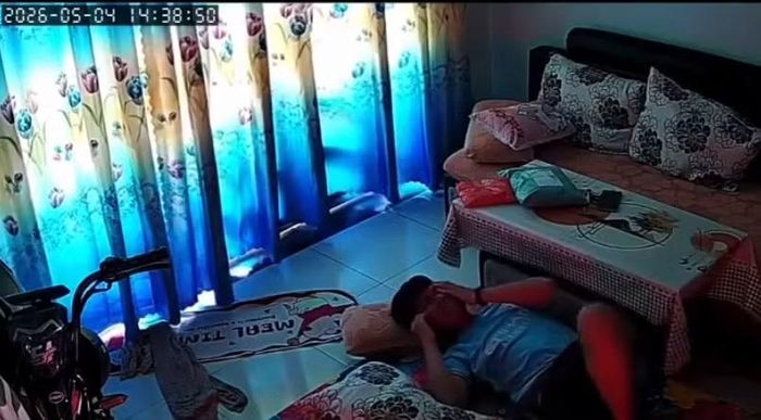 Hình ảnh thiếu niên bị người đàn ông đánh.