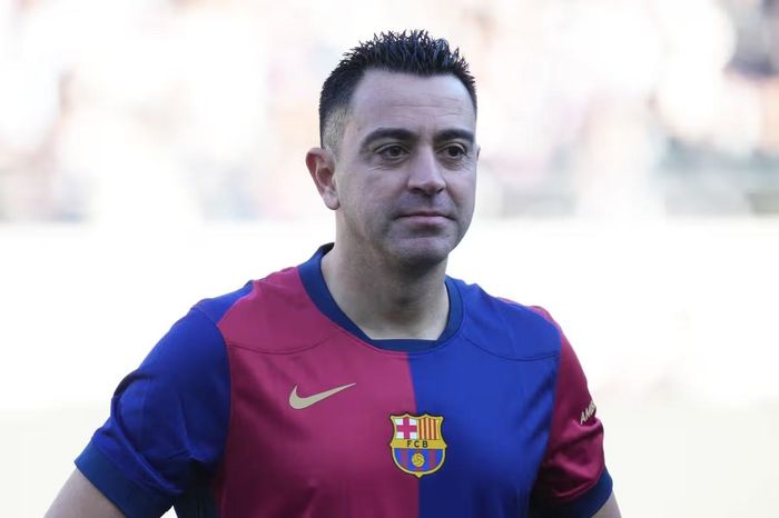  Xavi có sự nghiệp đỉnh cao thời làm cầu thủ. ẢNH: MIRROR/GETTY 