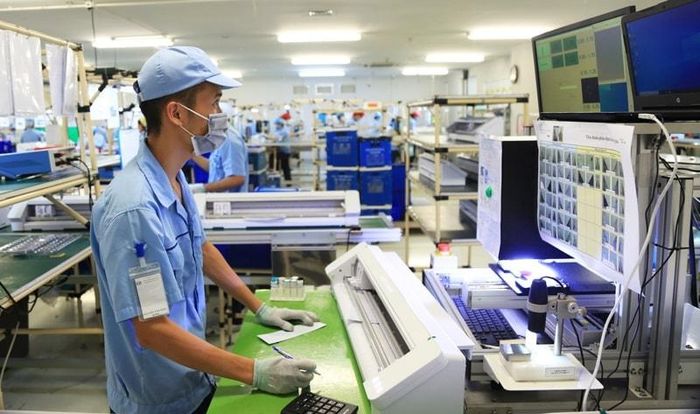 Sản xuất thiết bị điện tử tại Công ty TNHH Rhythm Precision Việt Nam, Khu công nghiệp Nội Bài (xã Sóc Sơn). Ảnh: Đỗ Tâm