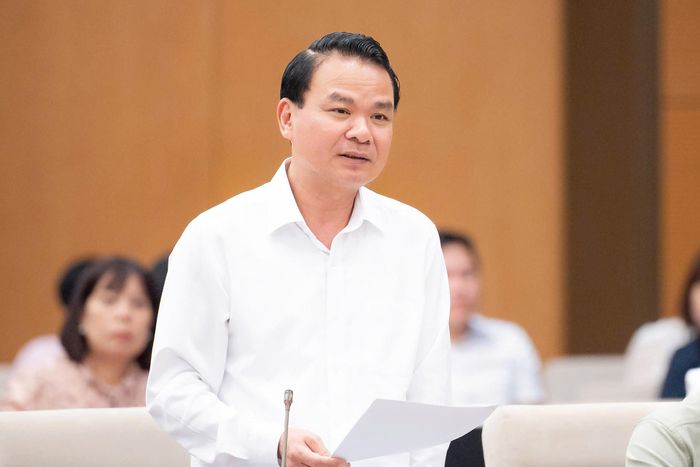 Bộ trưởng, Chủ nhiệm Văn phòng Chính phủ Đặng Xuân Phong báo cáo. Ảnh: QH