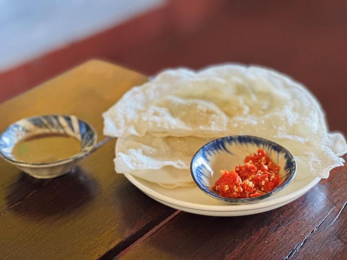 Bạn không nên ăn đu đủ với thực phẩm cay. Ảnh: Ban Mai