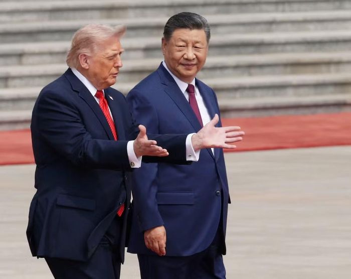 Tổng thống Mỹ Donald Trump và Tổng Bí thư, Chủ tịch Trung Quốc Tập Cận Bình trong lễ đón tại Đại lễ đường Nhân dân, Bắc Kinh, Trung Quốc ngày 14/5. Ảnh: Getty Images