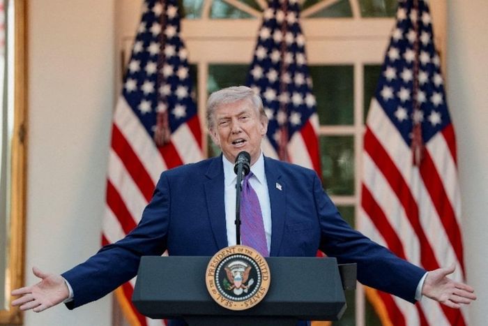 Tổng thống Trump đang thực hiện một thỏa thuận chưa từng có với Bộ Tư pháp Mỹ. Ảnh: Reuters.