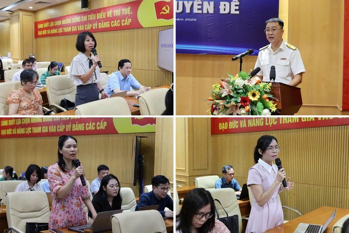 Các phóng viên trao đổi với đại diện Cục Thuế tại buổi họp báo. (Ảnh: Cục Thuế/Vietnam+)