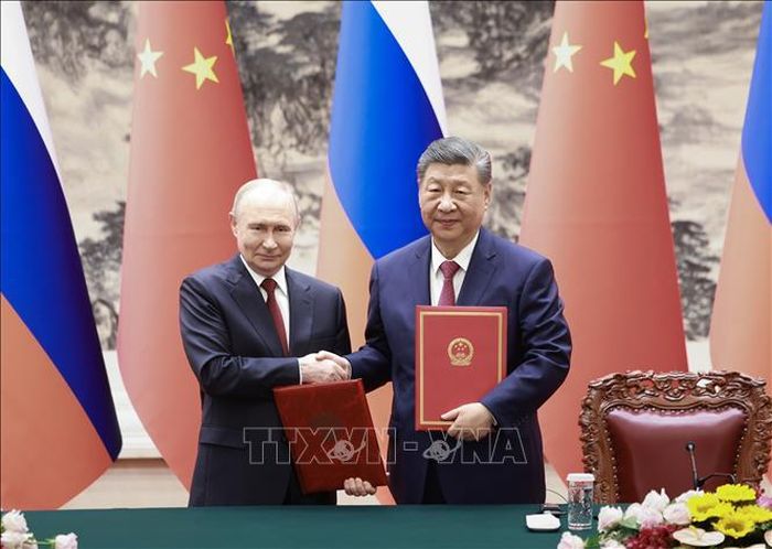 Tổng thống Nga Vladimir Putin và Chủ tịch Trung Quốc Tập Cận Bình tại cuộc gặp ở Bắc Kinh ngày 20/5/2026. Ảnh: THX/TTXVN