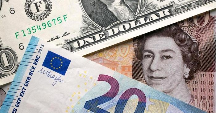 Nhiều đồng tiền mạnh giữ đà tăng, USD bán ra vượt 26.390 đồng. (Ảnh minh họa).