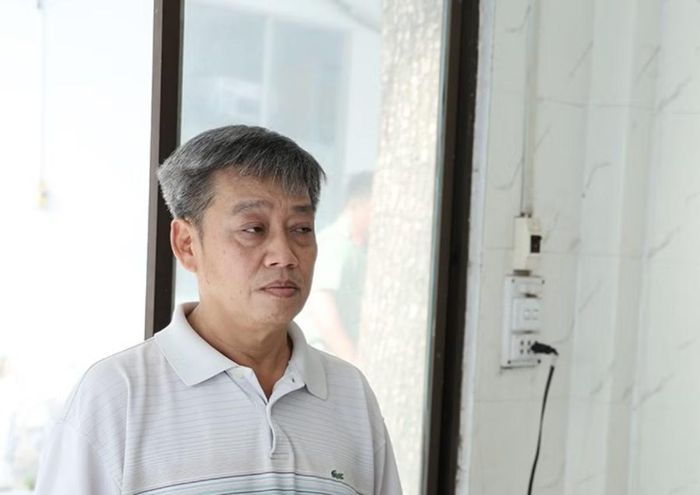 Nguyễn Huy Đạt tại cơ quan công an. Ảnh: T. Tầm