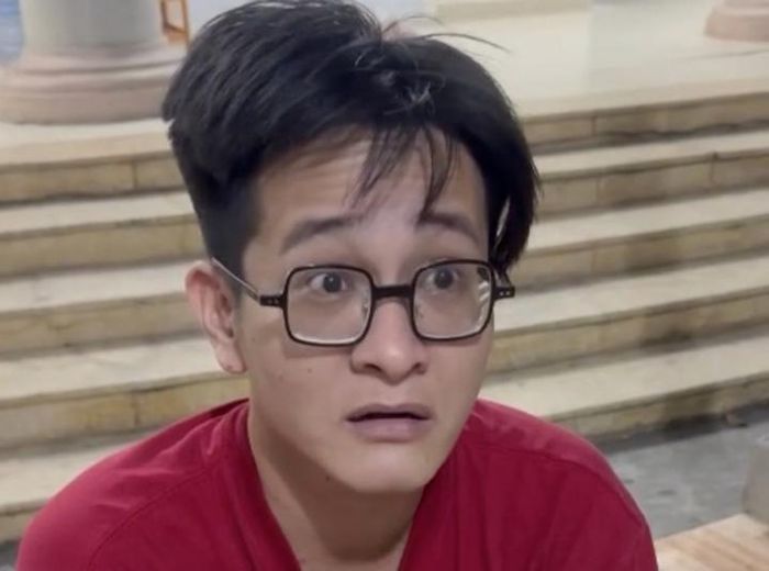 Rapper Mr.Nhân thời điểm bị công an bắt giữ. Ảnh: VTC News