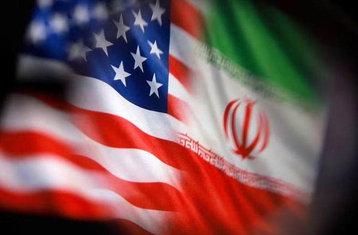 Hình ảnh đồ họa quốc kỳ Mỹ và Iran. (Nguồn: Reuters)