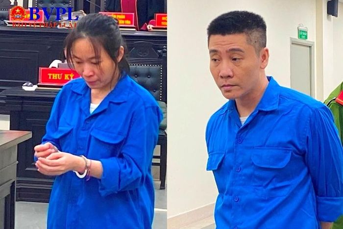 2 bị cáo Lê Thị Hạnh và Vũ Tiến Lâm được dẫn giải vào phòng xử án.
