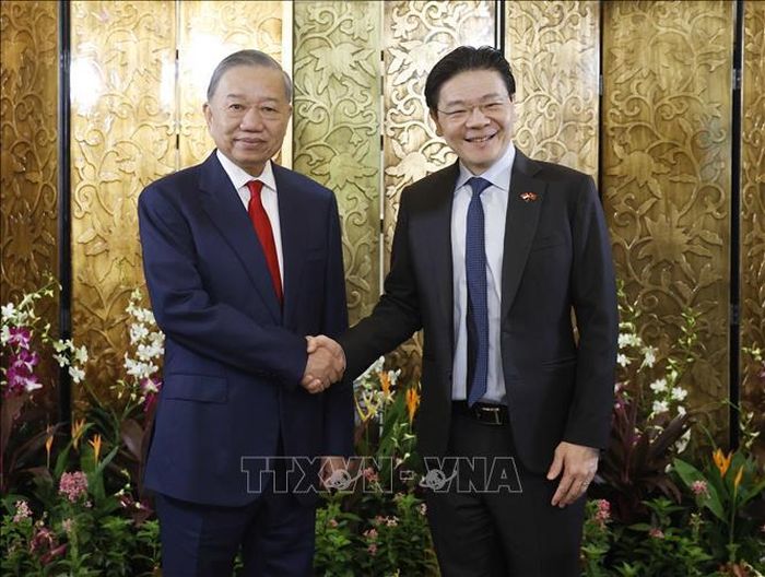 Tổng Bí thư, Chủ tịch nước Tô Lâm và Thủ tướng Singapore Lawrence Wong. Ảnh: Thống Nhất/TTXVN