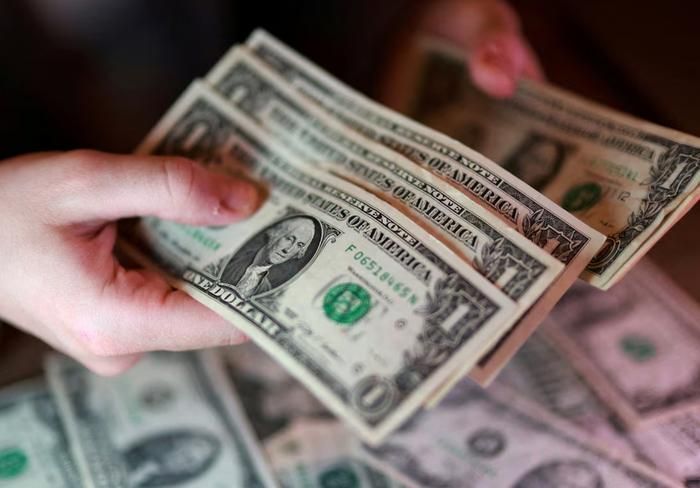 Đồng USD giảm giá sau tín hiệu tích cực từ Trung Đông. Ảnh: REUTERS