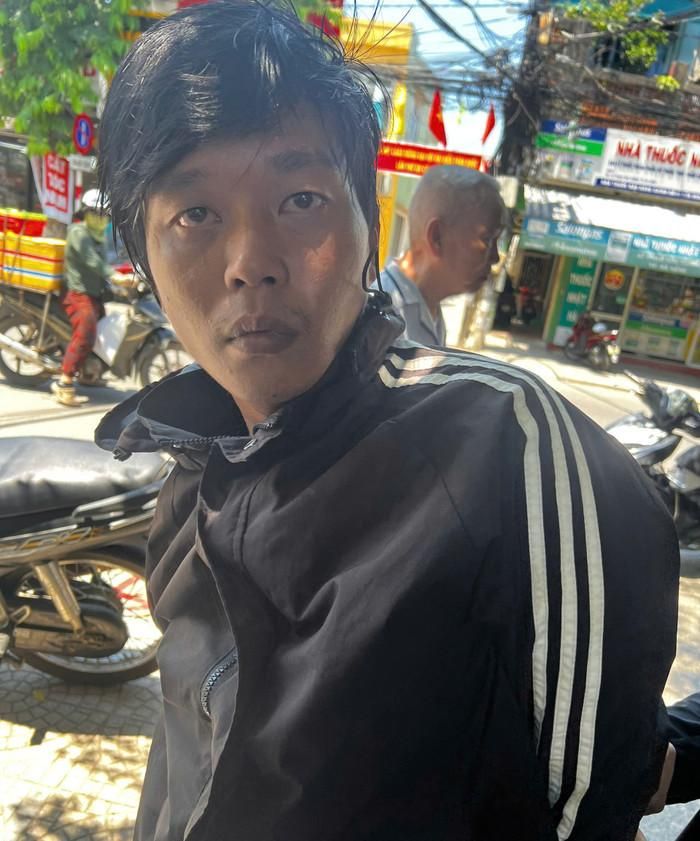 Đối tượng Dương Trung Nghĩa tại thời điểm bị bắt giữ. Ảnh: Công an TP Đà Nẵng 
