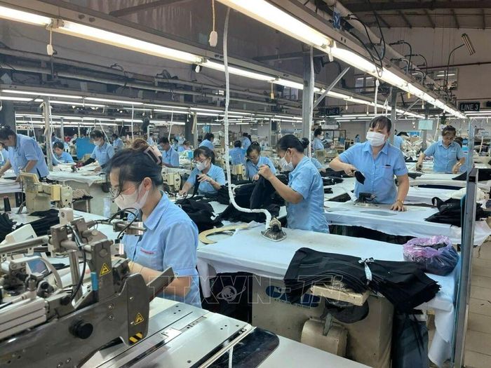 Doanh nghiệp tư nhân đang tạo ra nhiều việc làm cho người lao động. Ảnh: TTXVN