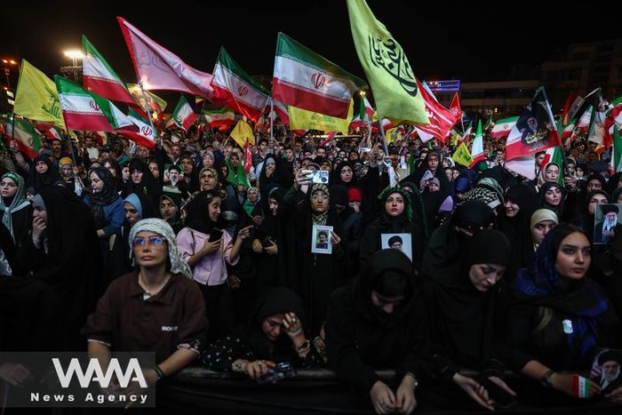 Người dân tham gia một cuộc tuần hành tại thủ đô Tehran (Iran) ngày 29-5. Ảnh: Majid Asgaripour/WANA