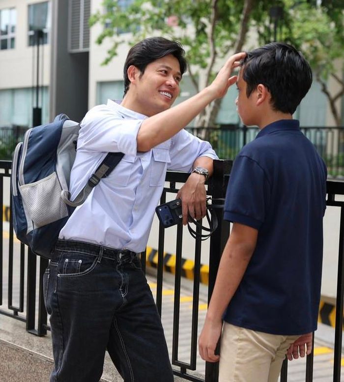 Nhạc sĩ Nguyễn Văn Chung và con trai.