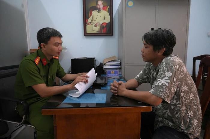 Nguyễn Công Nam tại cơ quan công an.